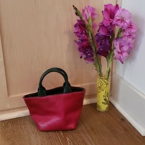 - Color blocked leather top handle bag